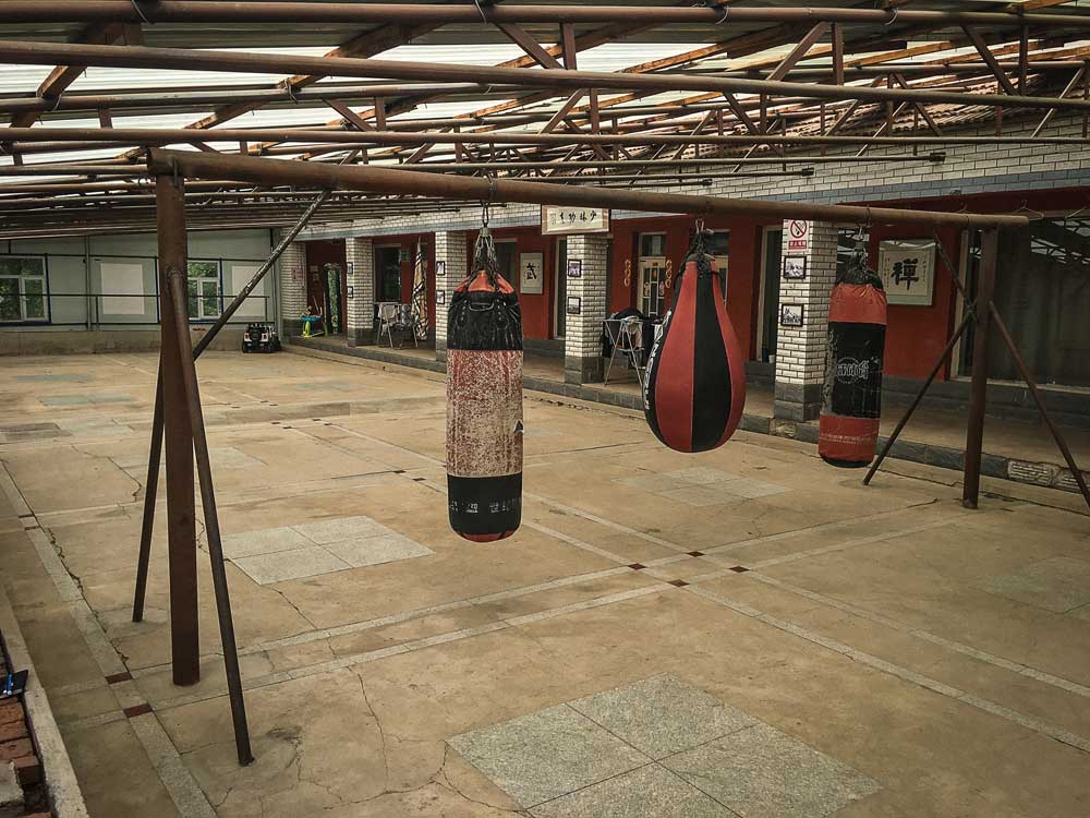Peter Rosendahl Blog Xing Long Kung Fu School main training hall with sandbags